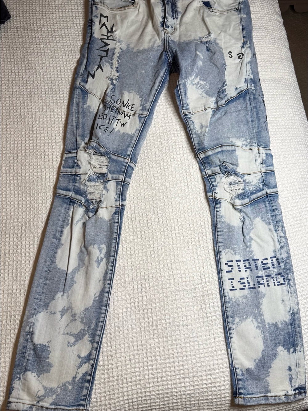 Men's Straight Light Blue Washed Jeans with Distressed Detailing